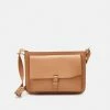 REDEZIGN UNISEX - Sac Bandoulière - Beige